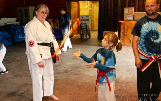 a child being held by a person