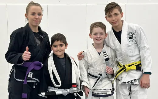 a group of people wearing karate uniforms