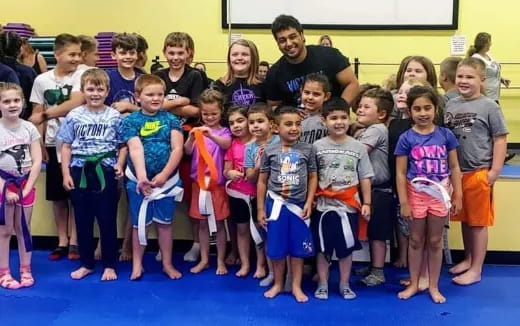 a group of children posing for a photo