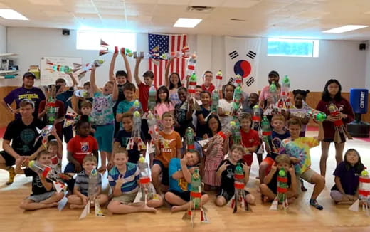 a group of people posing for a photo