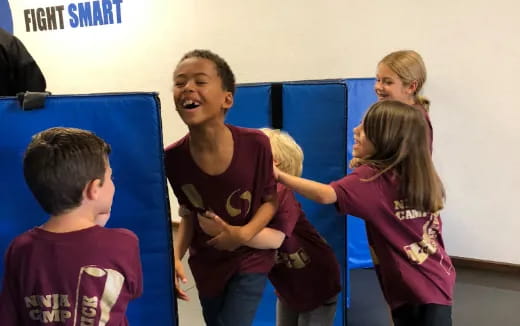 a group of children in a classroom