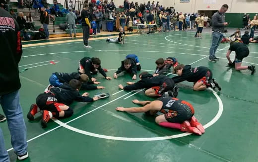 a group of people on a mat