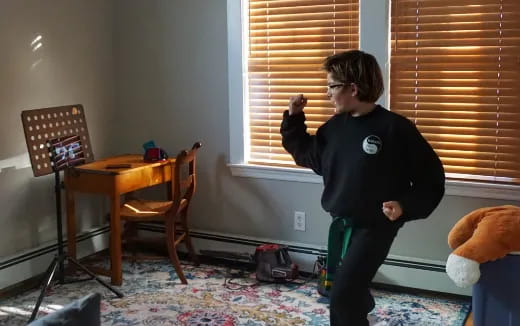 a boy playing with a toy