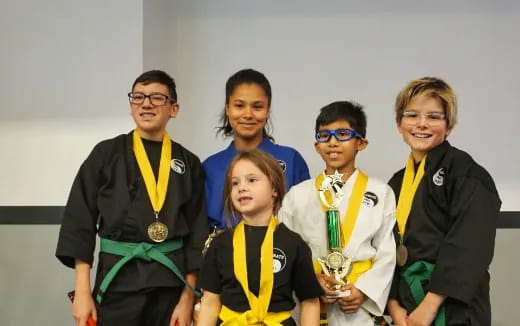 a group of people posing for a photo