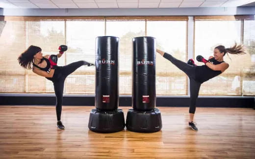 a couple of women exercising