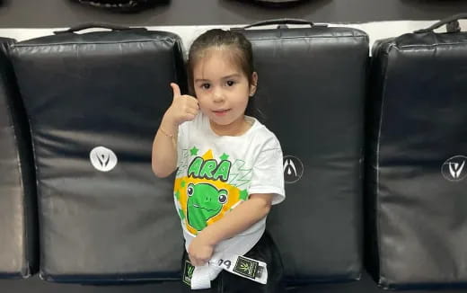 a child sitting in a car seat