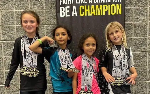 a group of girls posing for a picture