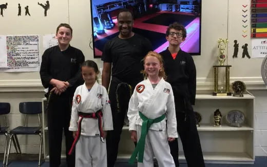 a group of people posing for a photo