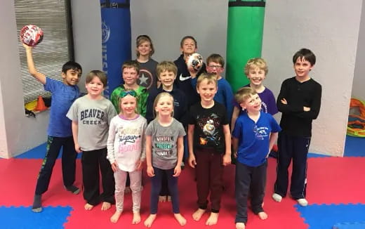 a group of children posing for a photo