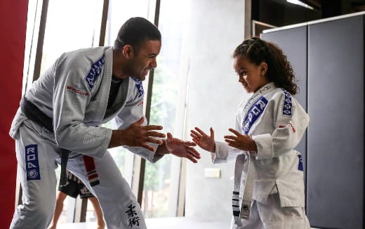 a man and a woman in white uniforms