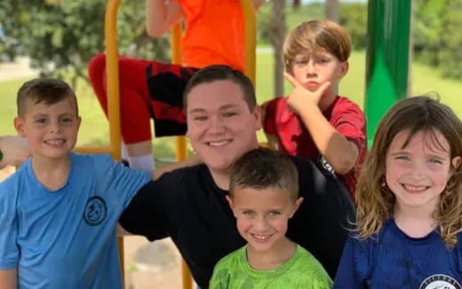 a group of children posing for a photo
