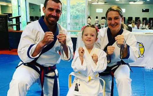 a group of people posing for the camera