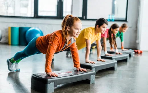 a group of children exercising