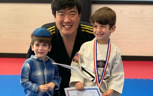 a person and two boys