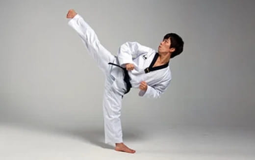 a man in white karate uniform
