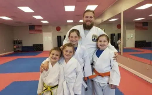 a group of people posing for the camera