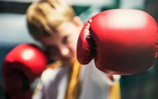 a boy wearing a red helmet