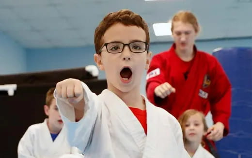 a group of boys in a room