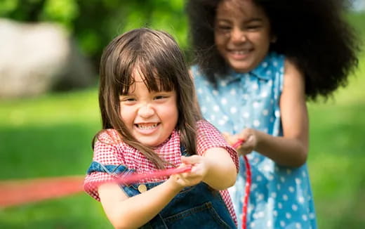 a person and a girl smiling