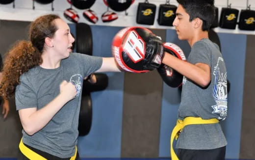 a man and a woman boxing
