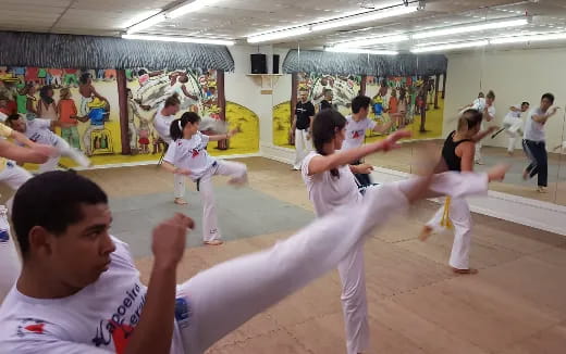 a group of people practicing martial arts