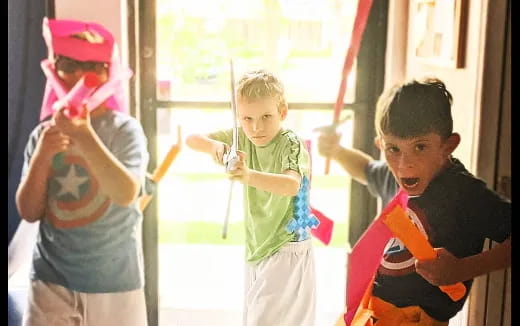 a group of kids playing with toys