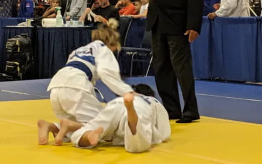 two people in karate uniforms