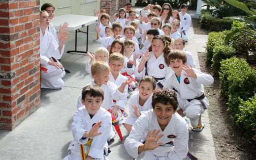 a group of people posing for a photo