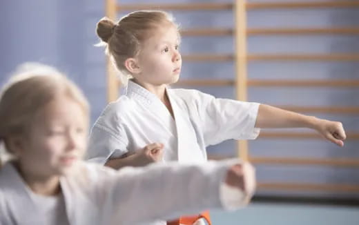 a young girl in a white shirt