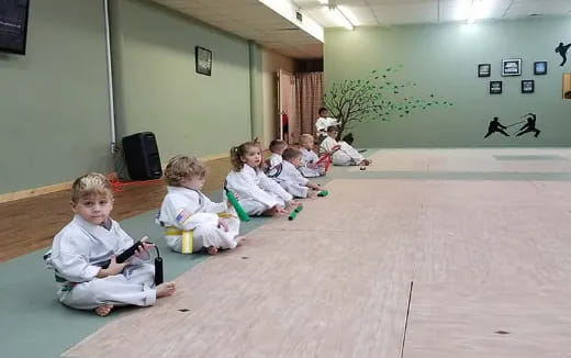 a group of children sitting on the floor