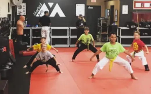 a group of people in a gym