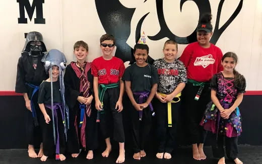 a group of people posing for a photo