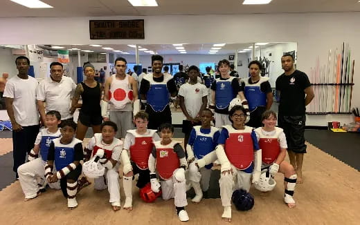 a group of people posing for a photo