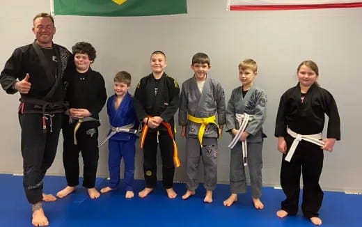 a group of people posing for a photo