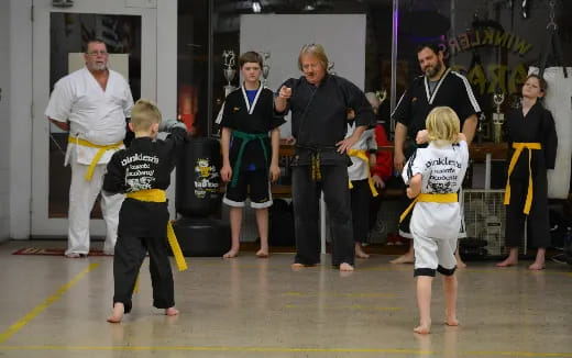 a group of people in a gym