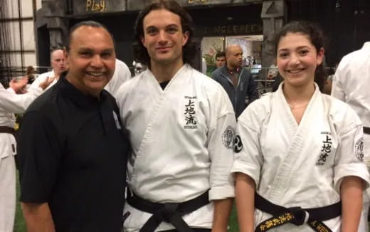 a group of men posing for a photo