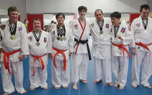 a group of people wearing karate uniforms