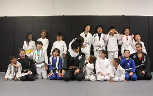 a group of people posing for a photo