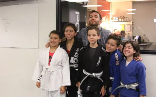 a group of people posing for a photo