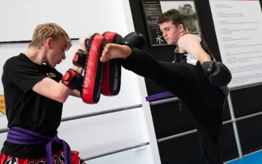 a couple of men in boxing gloves