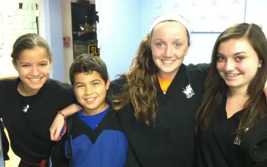 a group of people posing for a photo