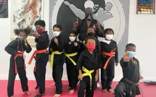 a group of children wearing masks