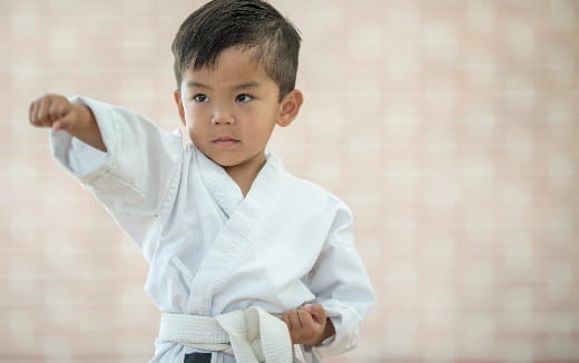 a baby in a white shirt