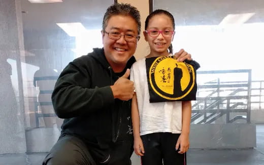 a man and a woman posing for a picture