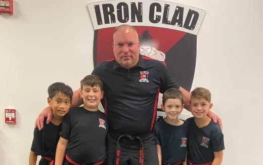 a man with a group of boys