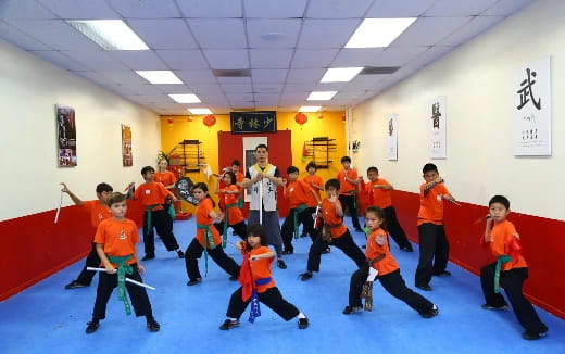 a group of children posing for a photo