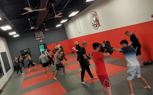 a group of people in a gym