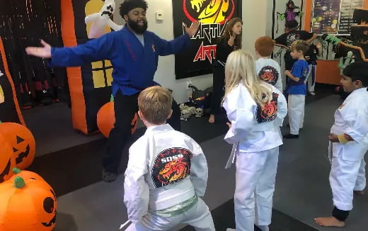 a person and a group of children