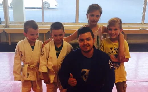 a group of boys posing for a picture