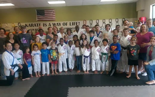 a group of people posing for a photo